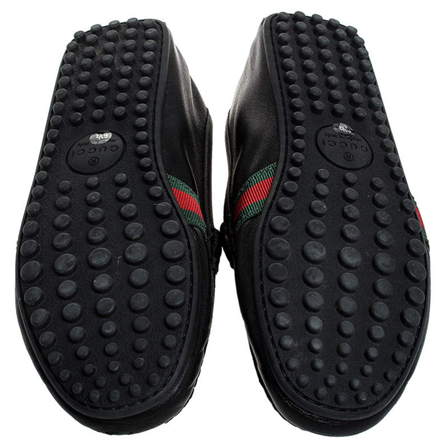 https://admin.thegioigiay.com/upload/product/2022/11/giay-luoi-gucci-black-leather-web-penny-loafers-mau-den-638458af3e7ad-28112022134359.jpg