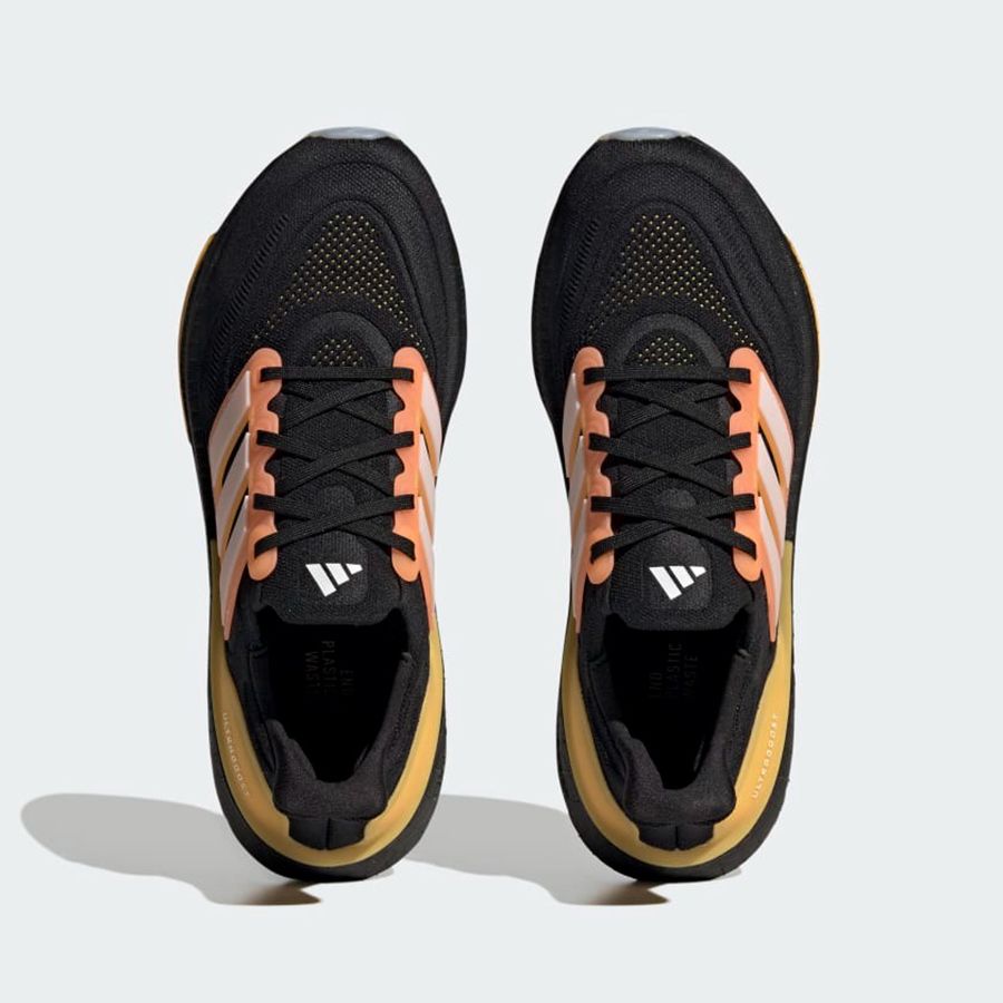 https://admin.thegioigiay.com/upload/product/2023/07/giay-chay-bo-nam-adidas-men-s-training-ultraboost-light-running-shoes-hq8595-mau-den-vang-42-5-64c08ec7d1f51-26072023101103.jpg